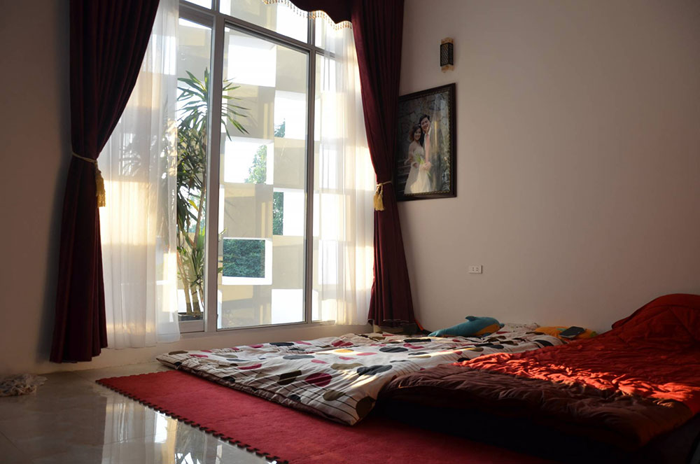 Mẫu thiết kế nhà phố 4 tầng với bức tường caro chắn nắng hướng Tây độc đáo